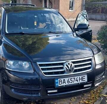 Чорний Фольксваген Туарег, об'ємом двигуна 2.99 л та пробігом 322 тис. км за 10500 $, фото 1 на Automoto.ua