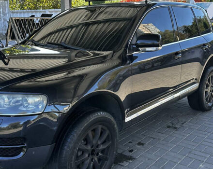 Черный Фольксваген Туарег, объемом двигателя 5 л и пробегом 270 тыс. км за 8750 $, фото 2 на Automoto.ua