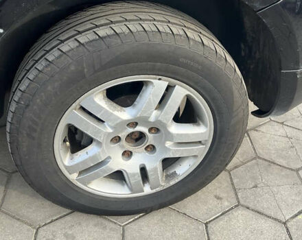 Черный Фольксваген Туарег, объемом двигателя 4.92 л и пробегом 350 тыс. км за 6500 $, фото 6 на Automoto.ua