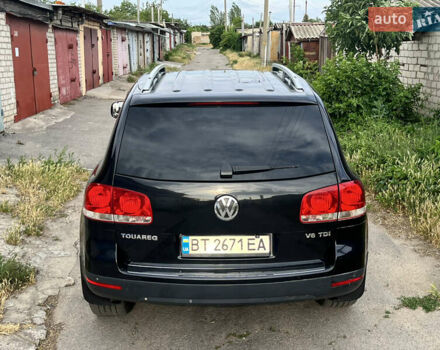 Чорний Фольксваген Туарег, об'ємом двигуна 3 л та пробігом 230 тис. км за 14000 $, фото 5 на Automoto.ua