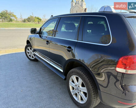 Черный Фольксваген Туарег, объемом двигателя 3 л и пробегом 340 тыс. км за 7500 $, фото 7 на Automoto.ua