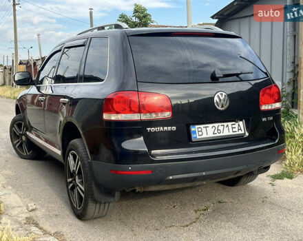 Чорний Фольксваген Туарег, об'ємом двигуна 3 л та пробігом 230 тис. км за 14000 $, фото 6 на Automoto.ua