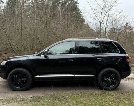 Чорний Фольксваген Туарег, об'ємом двигуна 3 л та пробігом 272 тис. км за 6500 $, фото 2 на Automoto.ua