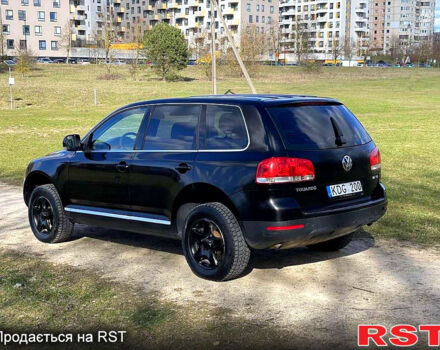 Черный Фольксваген Туарег, объемом двигателя 3 л и пробегом 357 тыс. км за 7440 $, фото 1 на Automoto.ua