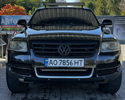 Черный Фольксваген Туарег, объемом двигателя 5 л и пробегом 270 тыс. км за 8750 $, фото 1 на Automoto.ua