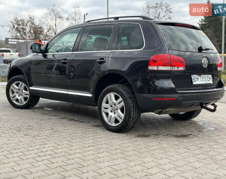 Черный Фольксваген Туарег, объемом двигателя 2.97 л и пробегом 421 тыс. км за 8000 $, фото 1 на Automoto.ua
