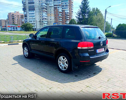 Черный Фольксваген Туарег, объемом двигателя 3.2 л и пробегом 318 тыс. км за 4950 $, фото 3 на Automoto.ua