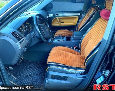 Черный Фольксваген Туарег, объемом двигателя 3 л и пробегом 340 тыс. км за 10800 $, фото 7 на Automoto.ua