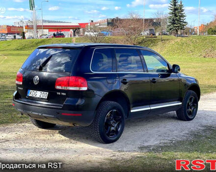 Черный Фольксваген Туарег, объемом двигателя 3 л и пробегом 357 тыс. км за 7440 $, фото 2 на Automoto.ua