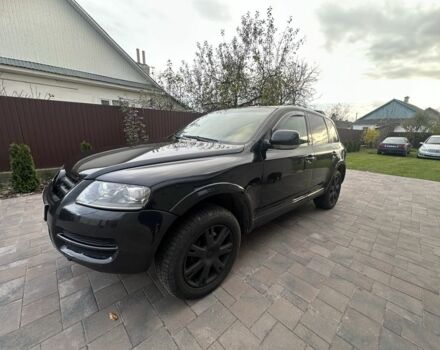 Черный Фольксваген Туарег, объемом двигателя 3 л и пробегом 490 тыс. км за 5700 $, фото 1 на Automoto.ua