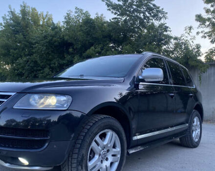 Черный Фольксваген Туарег, объемом двигателя 3 л и пробегом 340 тыс. км за 11000 $, фото 1 на Automoto.ua