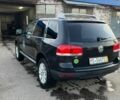 Чорний Фольксваген Туарег, об'ємом двигуна 3 л та пробігом 260 тис. км за 6410 $, фото 1 на Automoto.ua