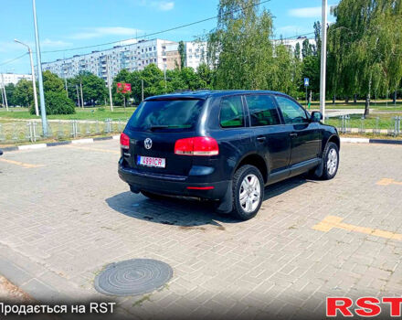 Черный Фольксваген Туарег, объемом двигателя 3.2 л и пробегом 318 тыс. км за 4950 $, фото 2 на Automoto.ua