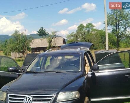 Чорний Фольксваген Туарег, об'ємом двигуна 3 л та пробігом 311 тис. км за 9600 $, фото 6 на Automoto.ua