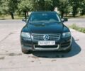 Чорний Фольксваген Туарег, об'ємом двигуна 2.5 л та пробігом 280 тис. км за 8000 $, фото 1 на Automoto.ua