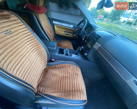 Черный Фольксваген Туарег, объемом двигателя 3 л и пробегом 340 тыс. км за 11000 $, фото 27 на Automoto.ua