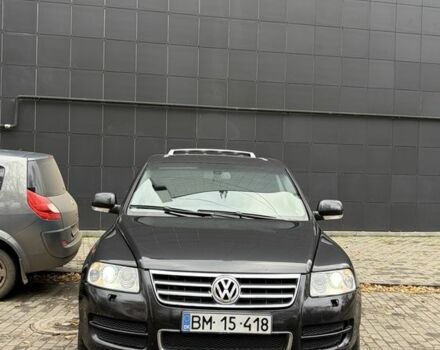 Чорний Фольксваген Туарег, об'ємом двигуна 5 л та пробігом 300 тис. км за 4700 $, фото 1 на Automoto.ua