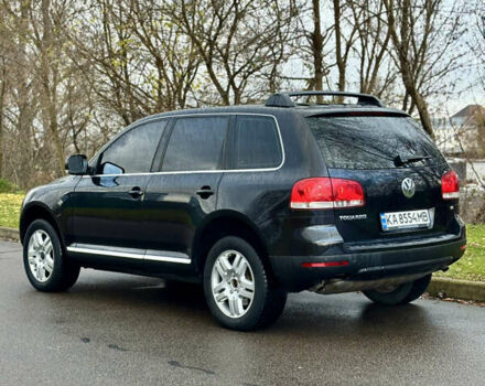 Чорний Фольксваген Туарег, об'ємом двигуна 3.2 л та пробігом 250 тис. км за 7500 $, фото 4 на Automoto.ua