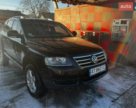 Черный Фольксваген Туарег, объемом двигателя 2.46 л и пробегом 325 тыс. км за 8700 $, фото 1 на Automoto.ua