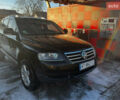 Черный Фольксваген Туарег, объемом двигателя 2.46 л и пробегом 325 тыс. км за 8700 $, фото 1 на Automoto.ua