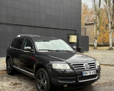 Чорний Фольксваген Туарег, об'ємом двигуна 5 л та пробігом 300 тис. км за 4700 $, фото 2 на Automoto.ua