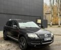 Чорний Фольксваген Туарег, об'ємом двигуна 5 л та пробігом 300 тис. км за 4700 $, фото 2 на Automoto.ua