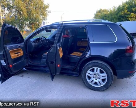 Черный Фольксваген Туарег, объемом двигателя 3 л и пробегом 340 тыс. км за 10800 $, фото 6 на Automoto.ua