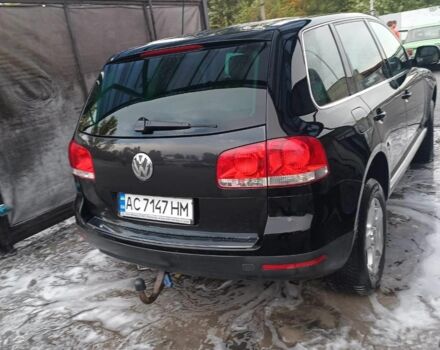 Чорний Фольксваген Туарег, об'ємом двигуна 3 л та пробігом 285 тис. км за 8500 $, фото 2 на Automoto.ua