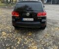 Чорний Фольксваген Туарег, об'ємом двигуна 3 л та пробігом 300 тис. км за 8500 $, фото 4 на Automoto.ua