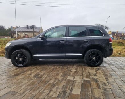 Чорний Фольксваген Туарег, об'ємом двигуна 3 л та пробігом 250 тис. км за 6648 $, фото 1 на Automoto.ua