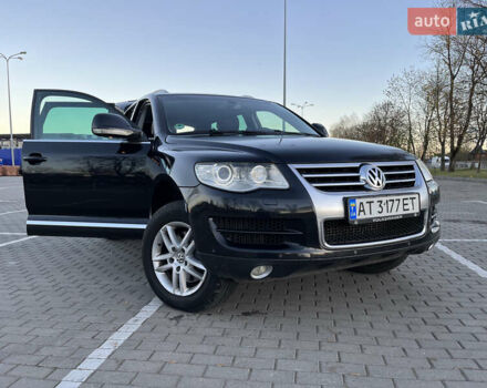Черный Фольксваген Туарег, объемом двигателя 3 л и пробегом 230 тыс. км за 10200 $, фото 1 на Automoto.ua