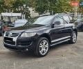 Черный Фольксваген Туарег, объемом двигателя 3.6 л и пробегом 250 тыс. км за 10700 $, фото 1 на Automoto.ua