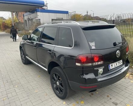 Черный Фольксваген Туарег, объемом двигателя 3 л и пробегом 373 тыс. км за 5400 $, фото 4 на Automoto.ua