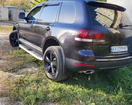 Черный Фольксваген Туарег, объемом двигателя 3 л и пробегом 270 тыс. км за 9500 $, фото 1 на Automoto.ua