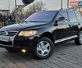 Чорний Фольксваген Туарег, об'ємом двигуна 3 л та пробігом 273 тис. км за 9999 $, фото 1 на Automoto.ua