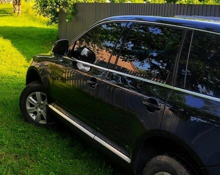 Чорний Фольксваген Туарег, об'ємом двигуна 3 л та пробігом 345 тис. км за 10500 $, фото 2 на Automoto.ua