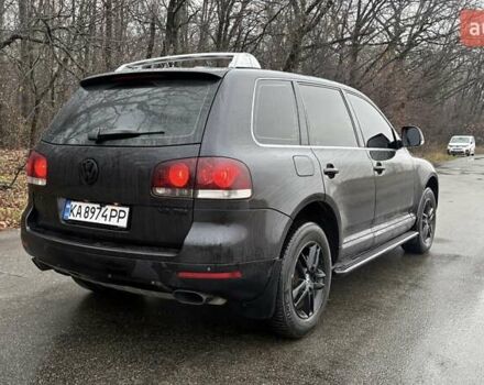 Черный Фольксваген Туарег, объемом двигателя 3 л и пробегом 239 тыс. км за 10300 $, фото 4 на Automoto.ua