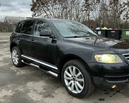 Чорний Фольксваген Туарег, об'ємом двигуна 3 л та пробігом 250 тис. км за 3350 $, фото 2 на Automoto.ua