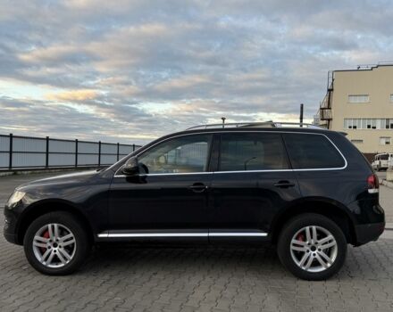 Чорний Фольксваген Туарег, об'ємом двигуна 3 л та пробігом 404 тис. км за 6500 $, фото 4 на Automoto.ua