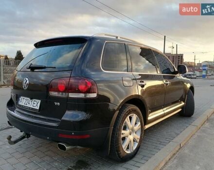 Чорний Фольксваген Туарег, об'ємом двигуна 3.6 л та пробігом 300 тис. км за 12500 $, фото 4 на Automoto.ua