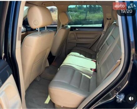 Фольксваген Туарег 2007 у Житомирі на Automoto.ua Чорний Фольксваген Туарег, об'ємом двигуна 2.97 л та пробігом 329 тис. км за 10600 $, фото 4 на Automoto.ua