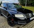 Черный Фольксваген Туарег, объемом двигателя 3 л и пробегом 290 тыс. км за 3200 $, фото 1 на Automoto.ua