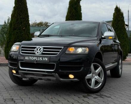 Чорний Фольксваген Туарег, об'ємом двигуна 3 л та пробігом 387 тис. км за 7300 $, фото 1 на Automoto.ua