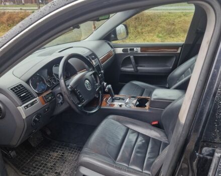 Чорний Фольксваген Туарег, об'ємом двигуна 3 л та пробігом 250 тис. км за 6648 $, фото 2 на Automoto.ua