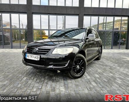Чорний Фольксваген Туарег, об'ємом двигуна 3 л та пробігом 236 тис. км за 9700 $, фото 2 на Automoto.ua