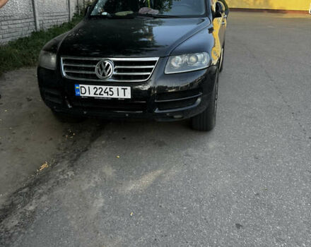 Черный Фольксваген Туарег, объемом двигателя 3.58 л и пробегом 300 тыс. км за 8000 $, фото 1 на Automoto.ua