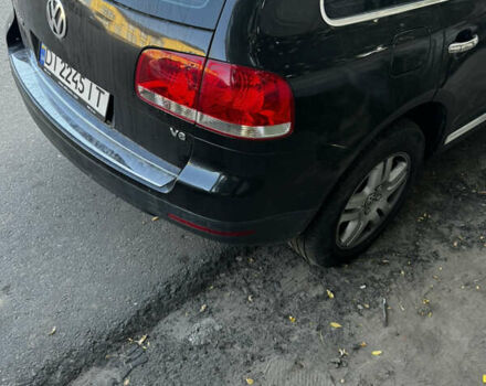 Черный Фольксваген Туарег, объемом двигателя 3.58 л и пробегом 300 тыс. км за 8000 $, фото 2 на Automoto.ua