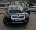 Чорний Фольксваген Туарег, об'ємом двигуна 3 л та пробігом 205 тис. км за 12000 $, фото 1 на Automoto.ua