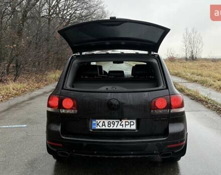 Черный Фольксваген Туарег, объемом двигателя 3 л и пробегом 239 тыс. км за 10300 $, фото 6 на Automoto.ua