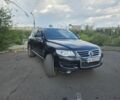 Черный Фольксваген Туарег, объемом двигателя 3 л и пробегом 213 тыс. км за 9800 $, фото 1 на Automoto.ua